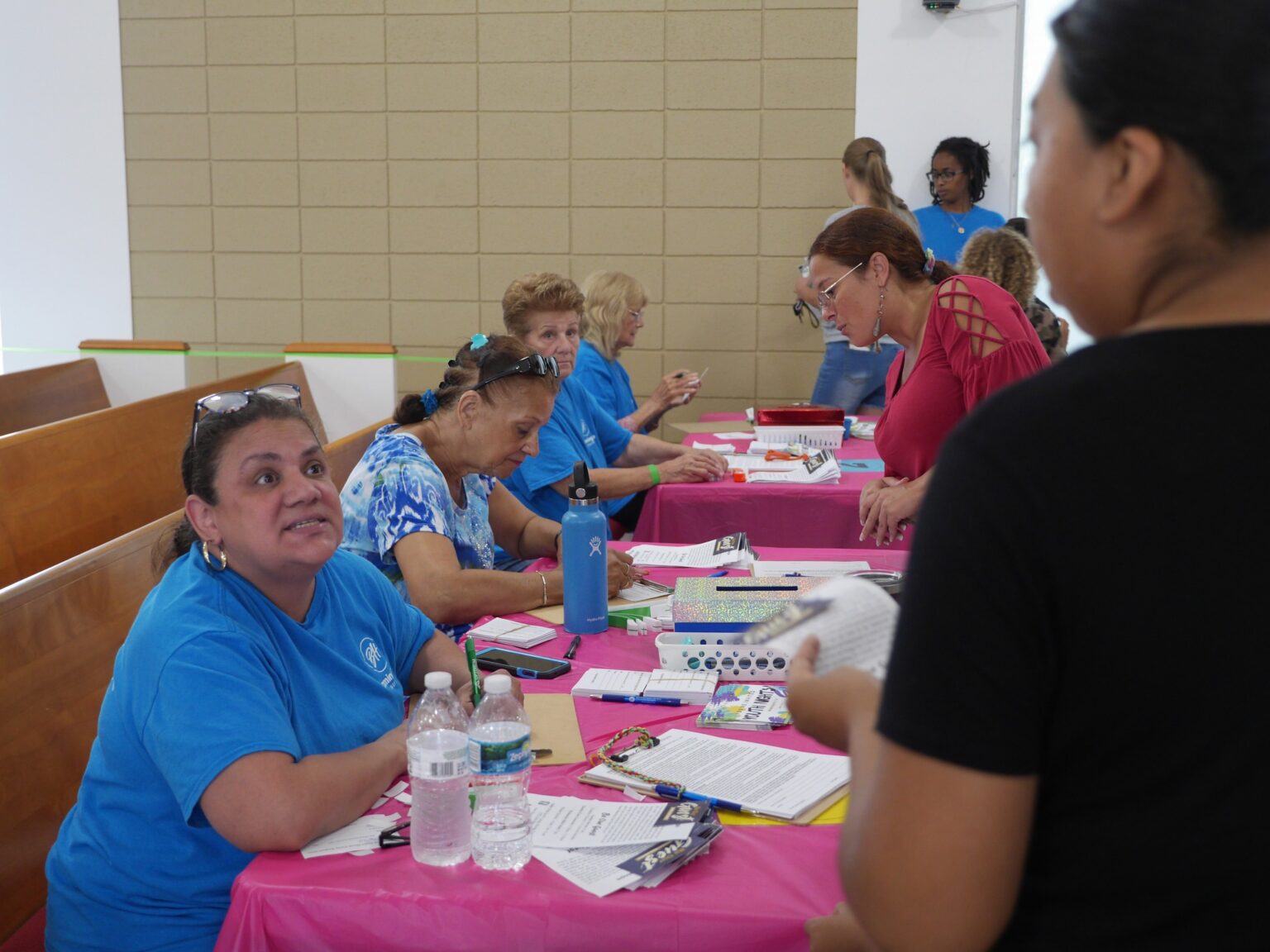 Community volunteers at registration table